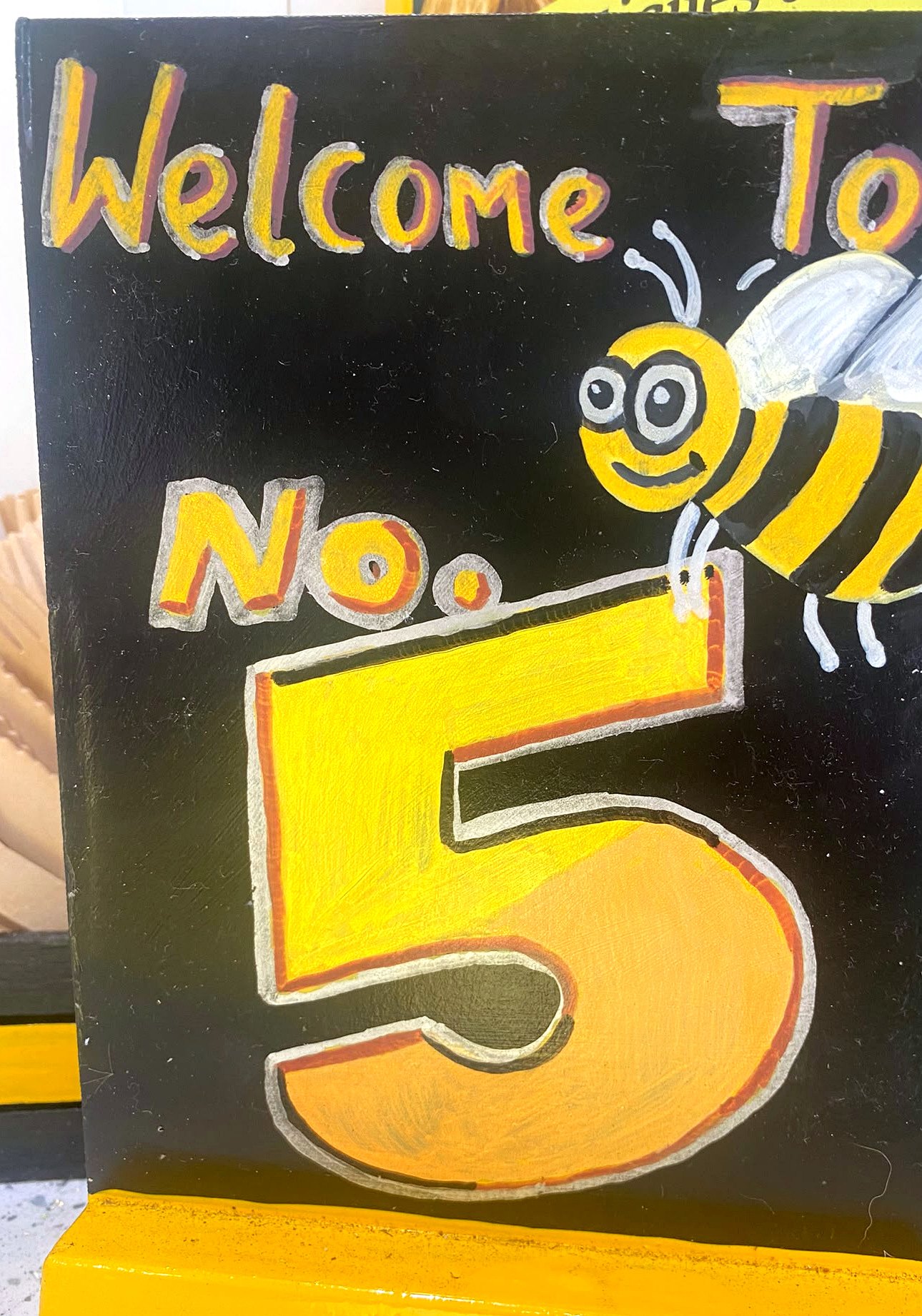 Hand-painted welcome sign